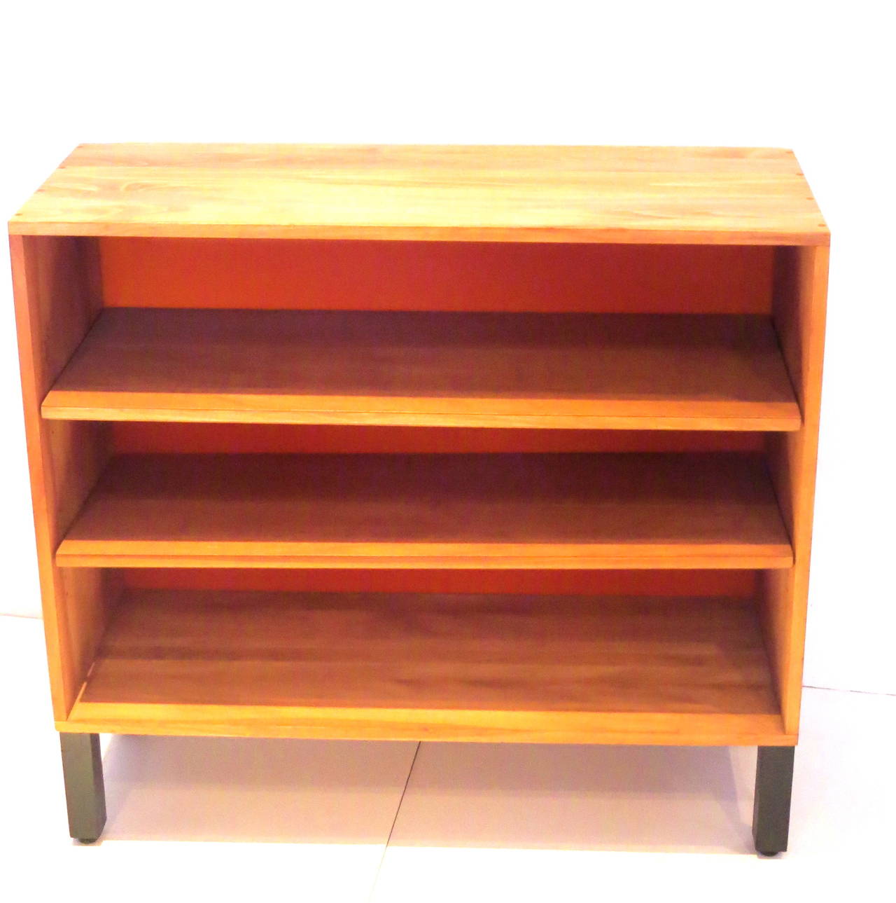 Mid-Century Modern American Modern 1950s  solid ash wood book caze with orange back.