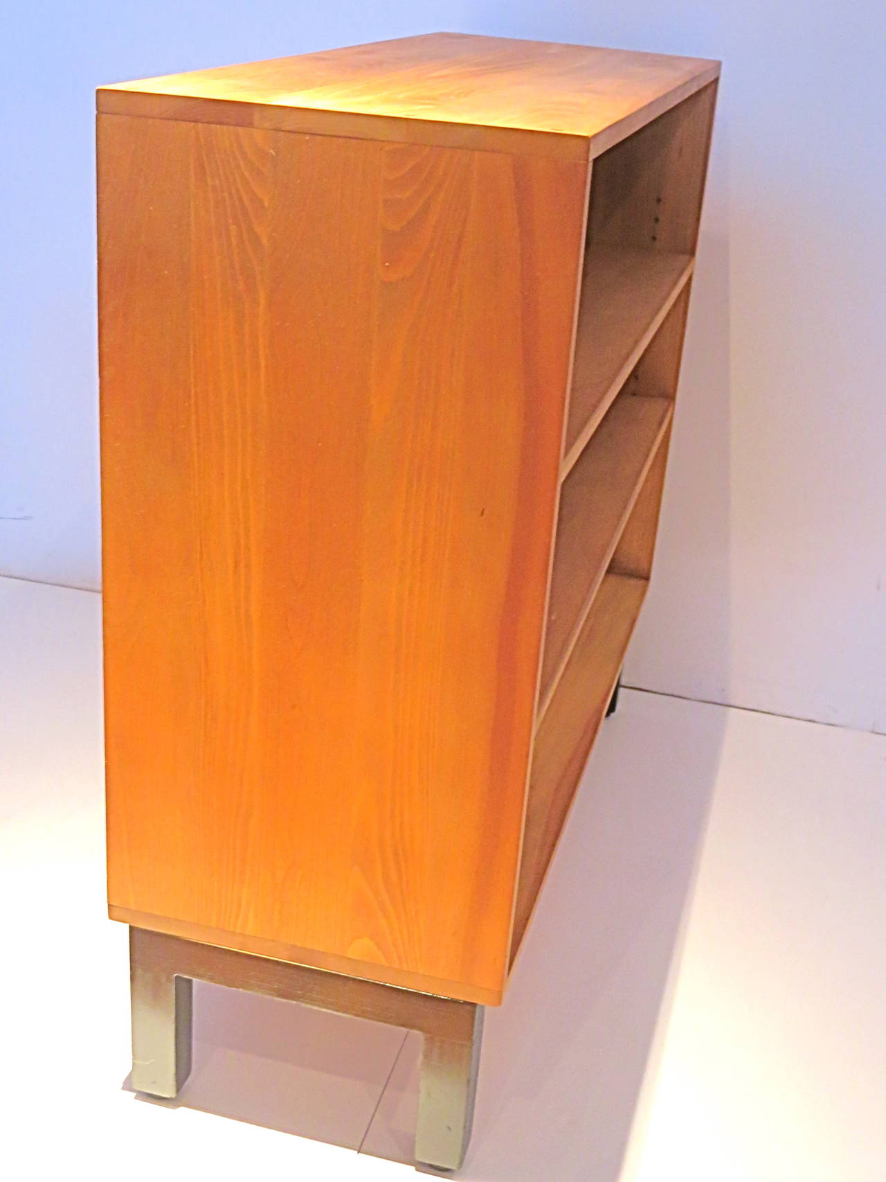 20th Century American Modern 1950s  solid ash wood book caze with orange back.