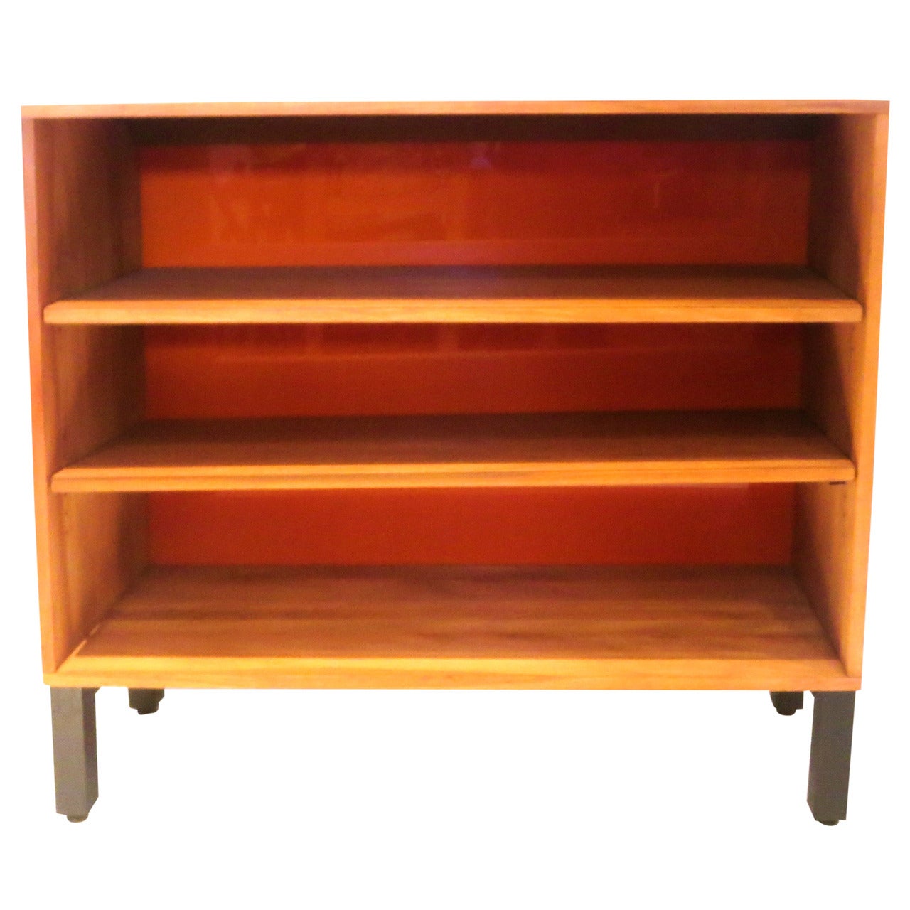 American Modern 1950s  solid ash wood book caze with orange back.