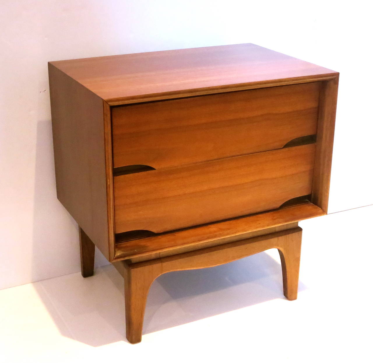 Walnut 1950s American modern Pair of double drawer walnut night stands by Kent Coffey
