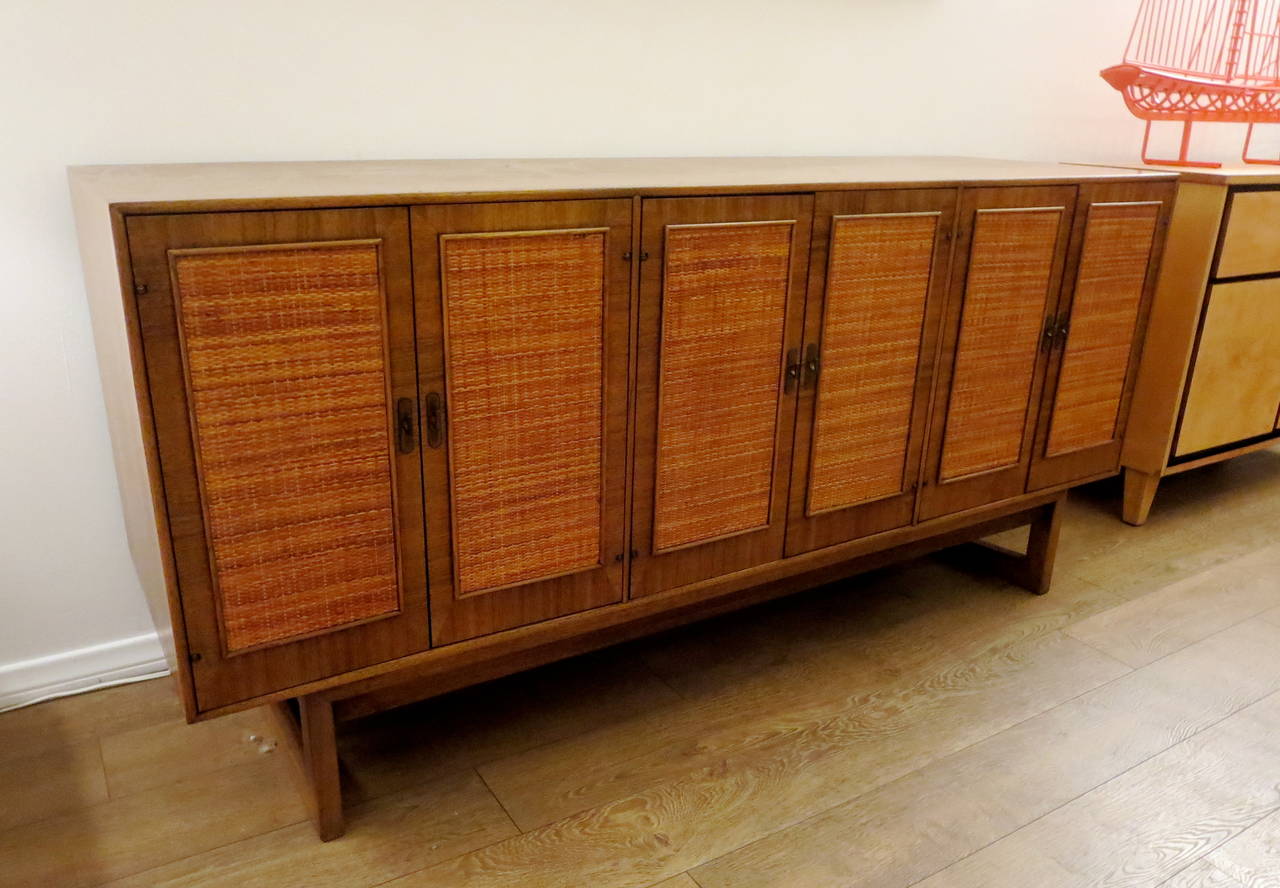 A beautiful 9 drawer 6 panel front door credenza , circa 1950s American very good quality , great design and great original condition simple and elegant, can be used as a dresser.