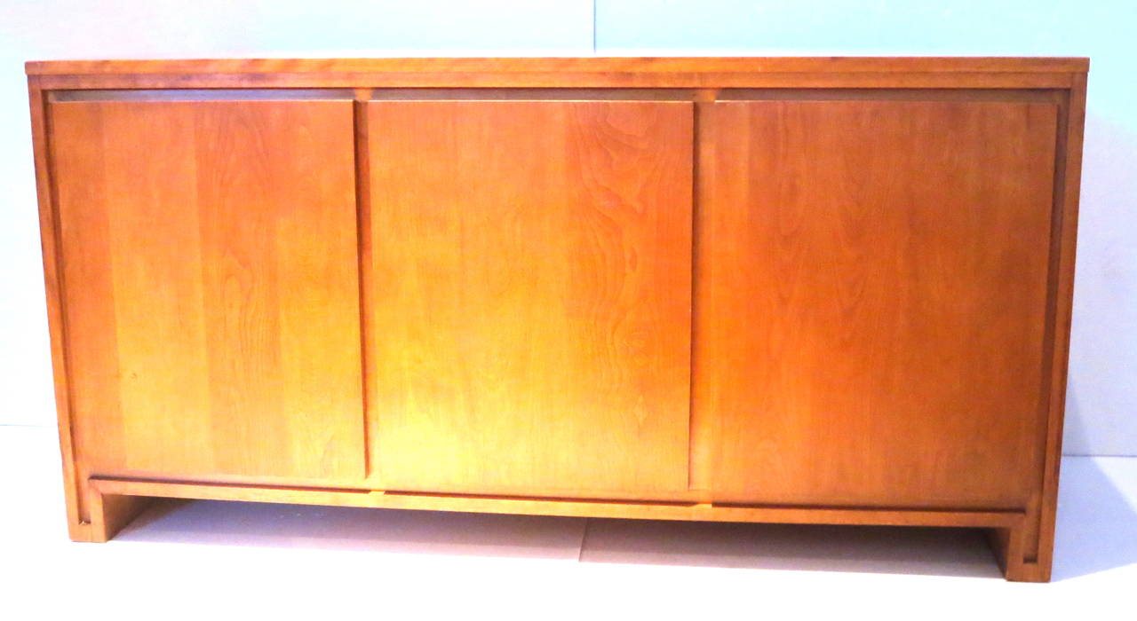 Simple elegant credenza / sideboard designed by Russel Wright for Conant Ball, circa 1950s solid maple original finish and original condition very clean , light wear ,small size and very good quality.