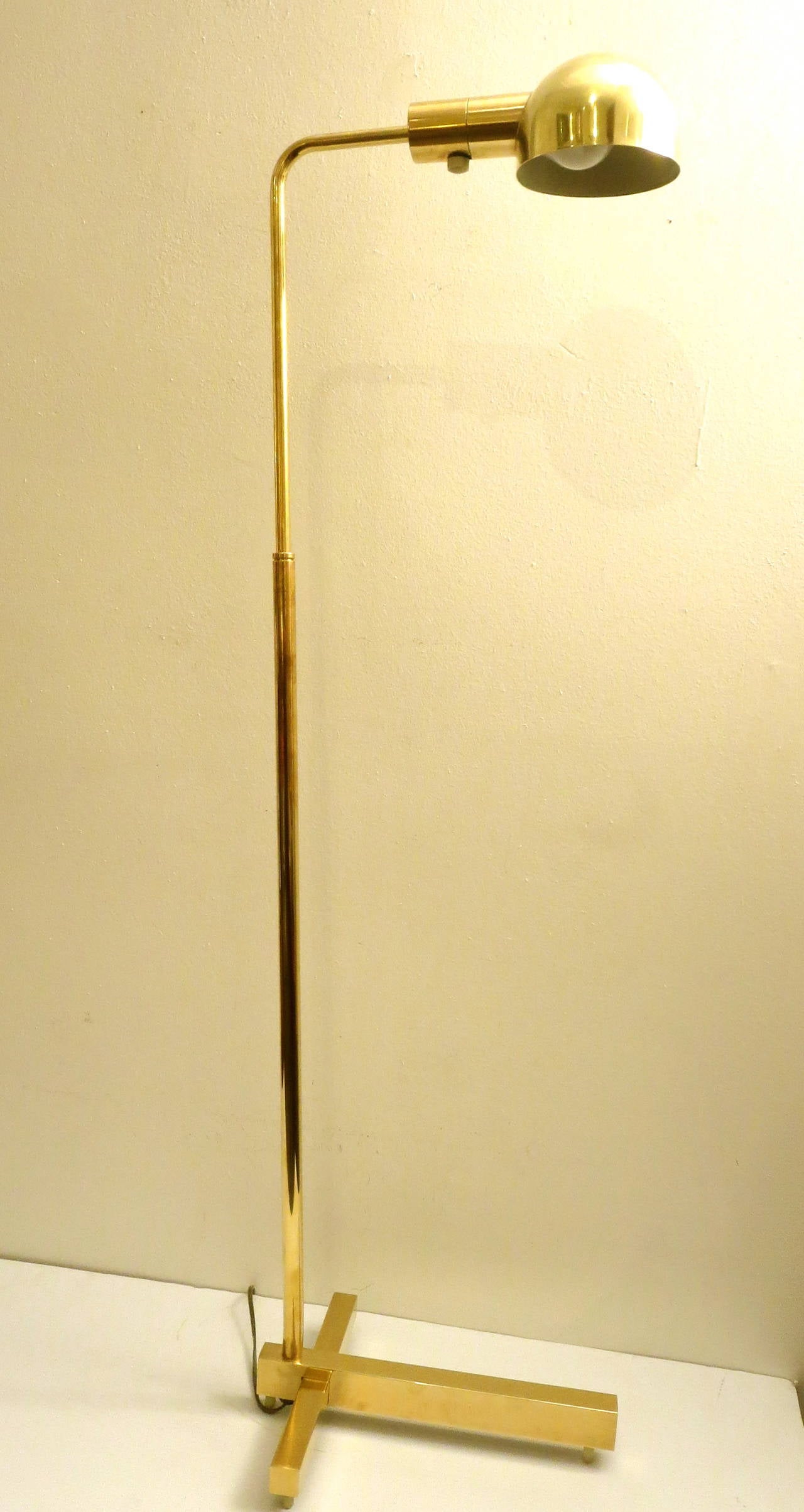 1970s Pair of multidirectional floor lamps in brass by Casella lighting 1