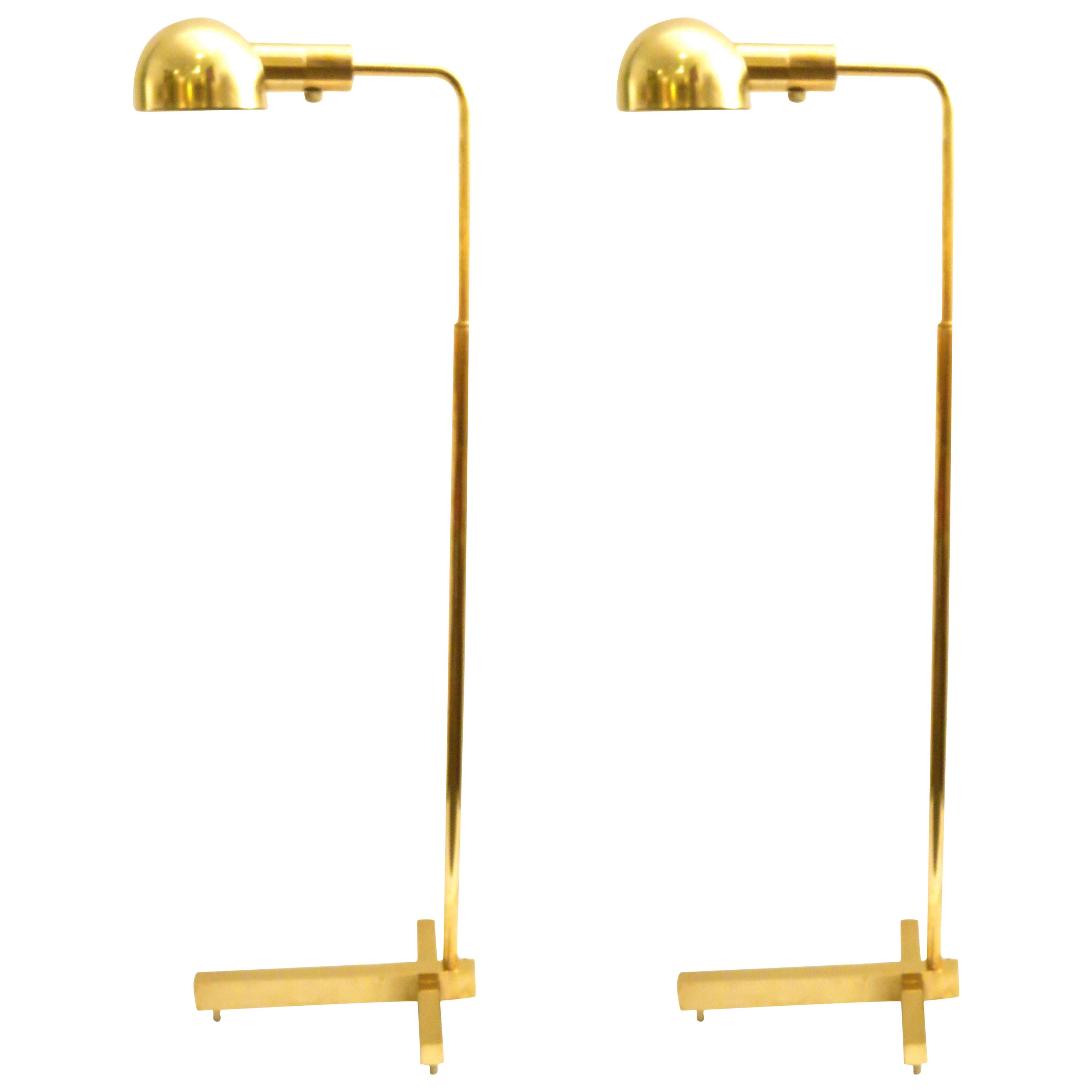 1970s Pair of multidirectional floor lamps in brass by Casella lighting