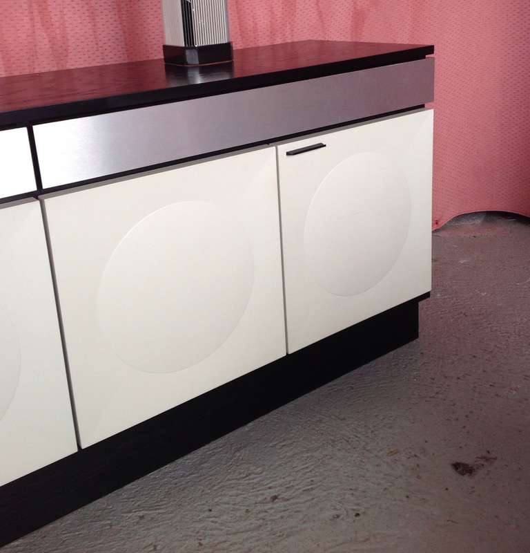 Beautiful Sideboard, black ebonized Oak with white graphics doors and aluminum drawers.