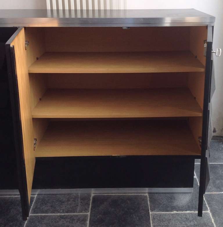 Late 20th Century Ebonised Oak Brutalist Sideboard With Graphic Surface Sculptural Shapes Doors.