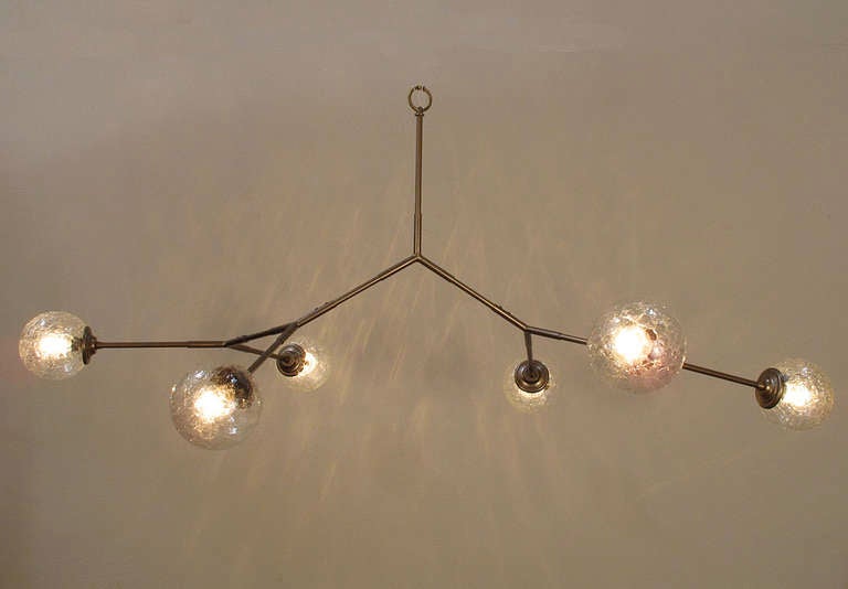 Light Fixture created with Vintage Glass Globes; mounts directly to ceiling. Shown in painted bronze finish. 

6 Lights - medium base bulbs - UL Listed, wired in USA

This item is not in stock but is now made to order. The lead time is 4-5