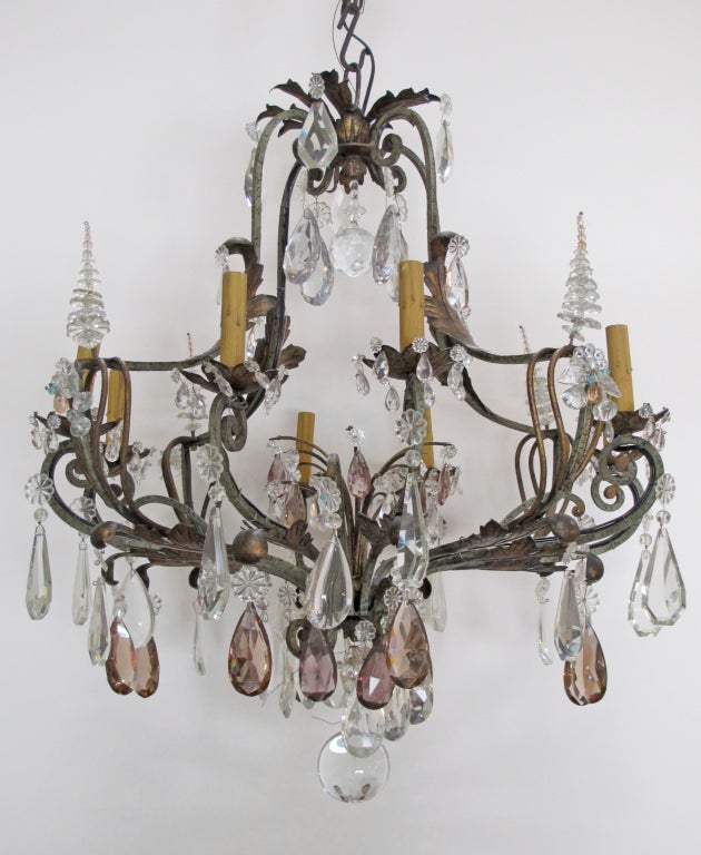 Late 19th C Spanish Hand Forged 8 Light Crystal Chandelier. Beautiful finish with gold details.  Unique crystals. Beautifully detailed chandelier perfect for a master bedroom or woman's dressing room. 

Courtesy to the trade.
