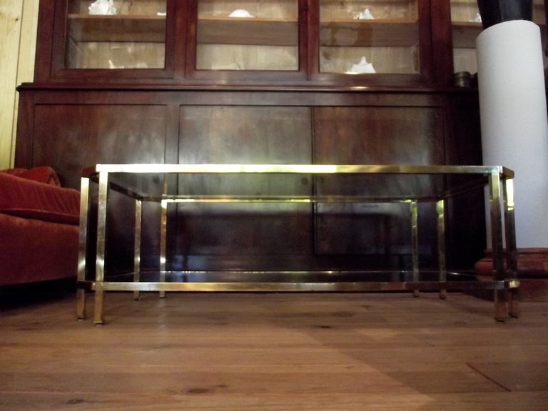 Coffee table gilt plated,2 levels and beveled glass on top