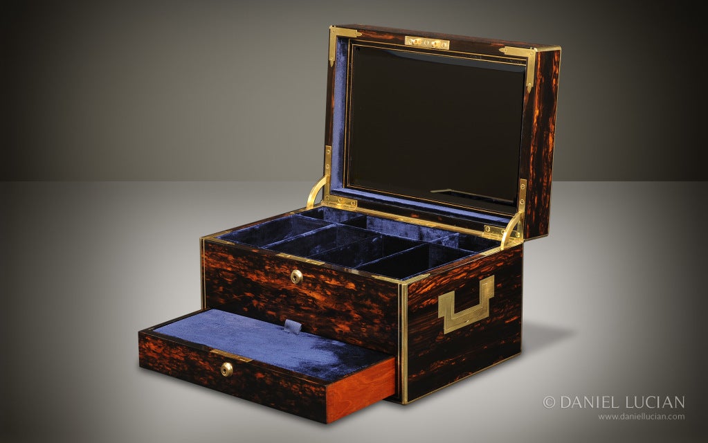 This stylish jewelry box, with its exquisitely figured coromandel veneer, brass edging, and flush side handles, dates back to the late 1860s and was originally retailed by Asprey.

During Victorian times, Asprey was considered one of the most