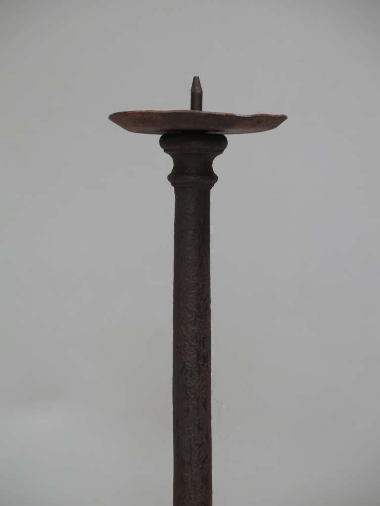 antique iron candle holder