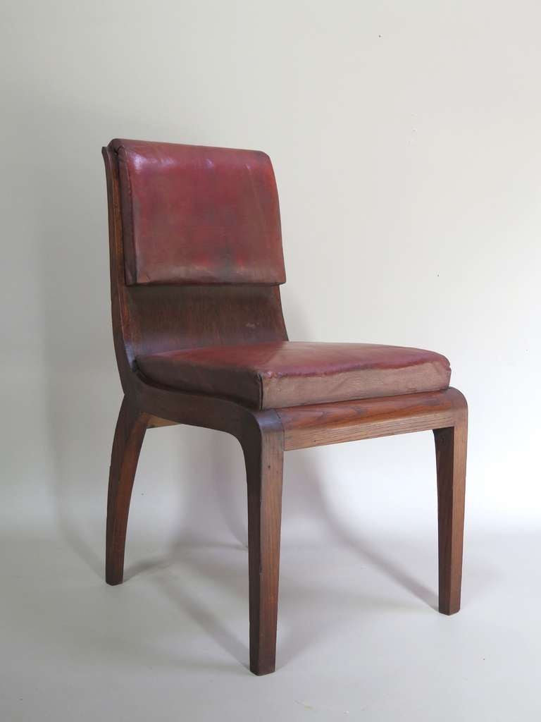 Set of six Art Deco leather-upholstered dining chairs with fabulous lines.