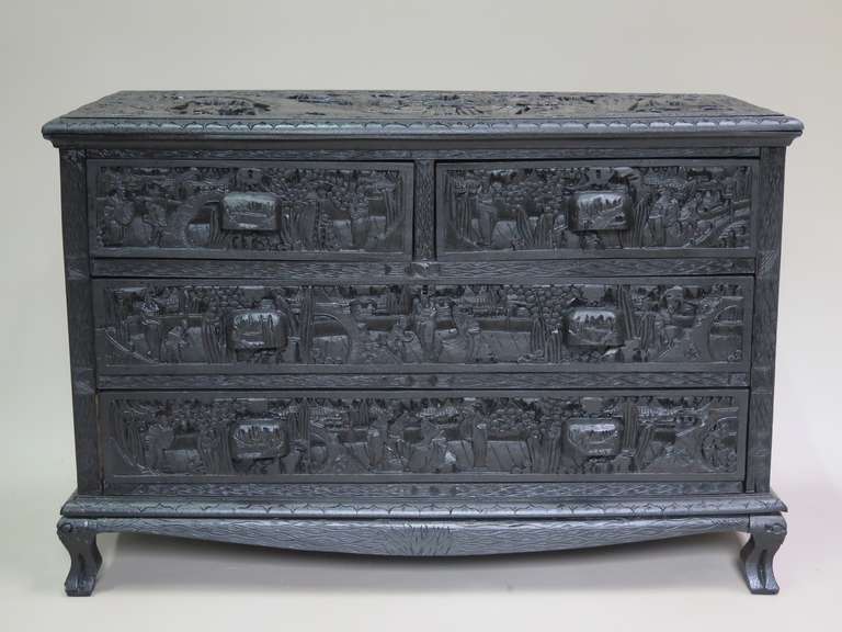 Charming chest of drawers, elaborately carved all over (front, top & sides). There are two small drawers at the top and two long drawers beneath.