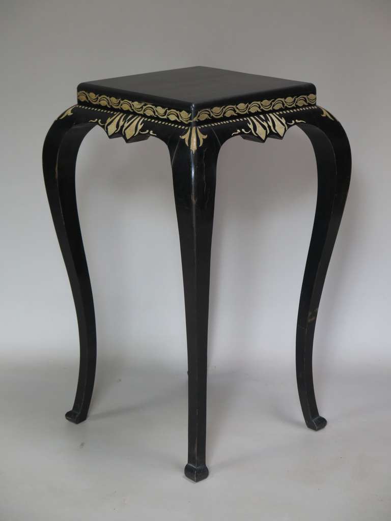 Delicate-looking plant stand/pedestal table with very elegant lines. Cabriole legs; painted frieze around the top.