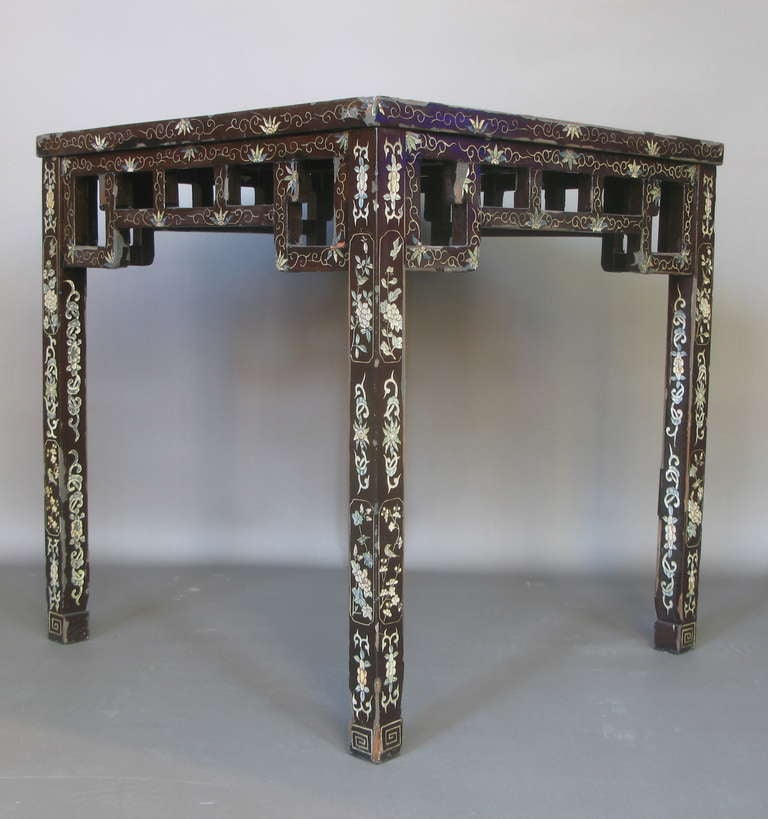 Lovely antique games table, decorated with delicate stylised flora and fauna, and a large central medallion on the top depicting a chinese scene.