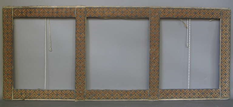 Lovely frame covered in velvet and elaborately embroidered with meticulously stitched motifs in a metallic-looking thread.

Probably the work of a meditating priest or nun.