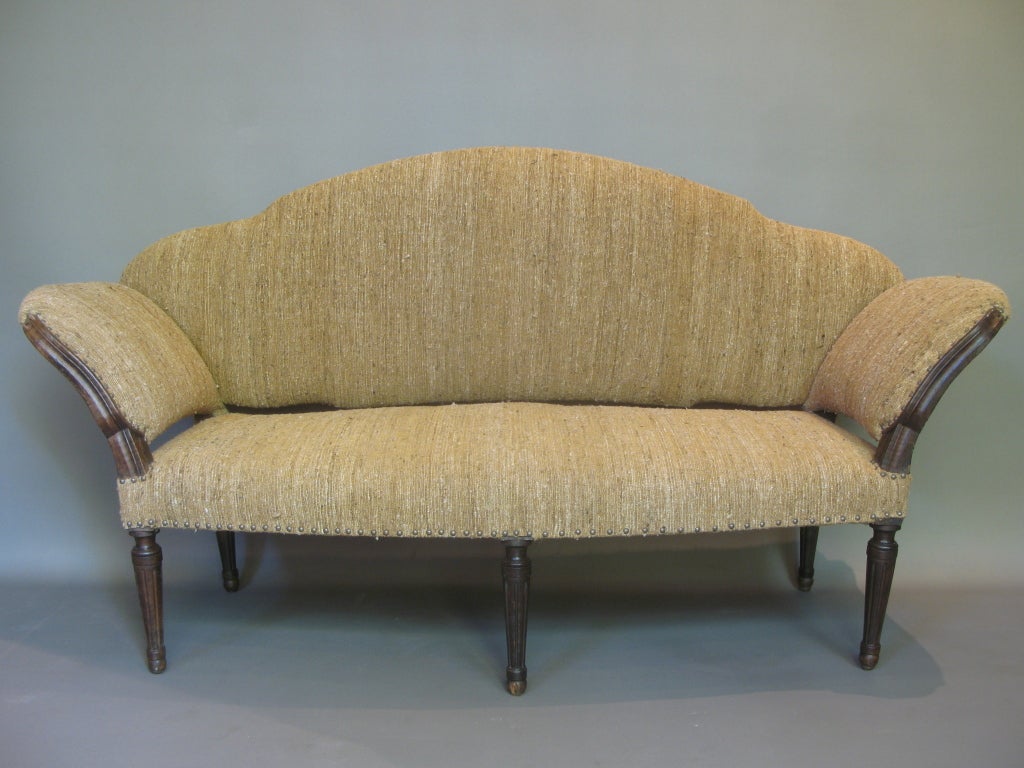 An elegant piece of furniture of graceful design.

Supported by fluted & tapering legs.

Newly reupholstered in vintage wool fabric.