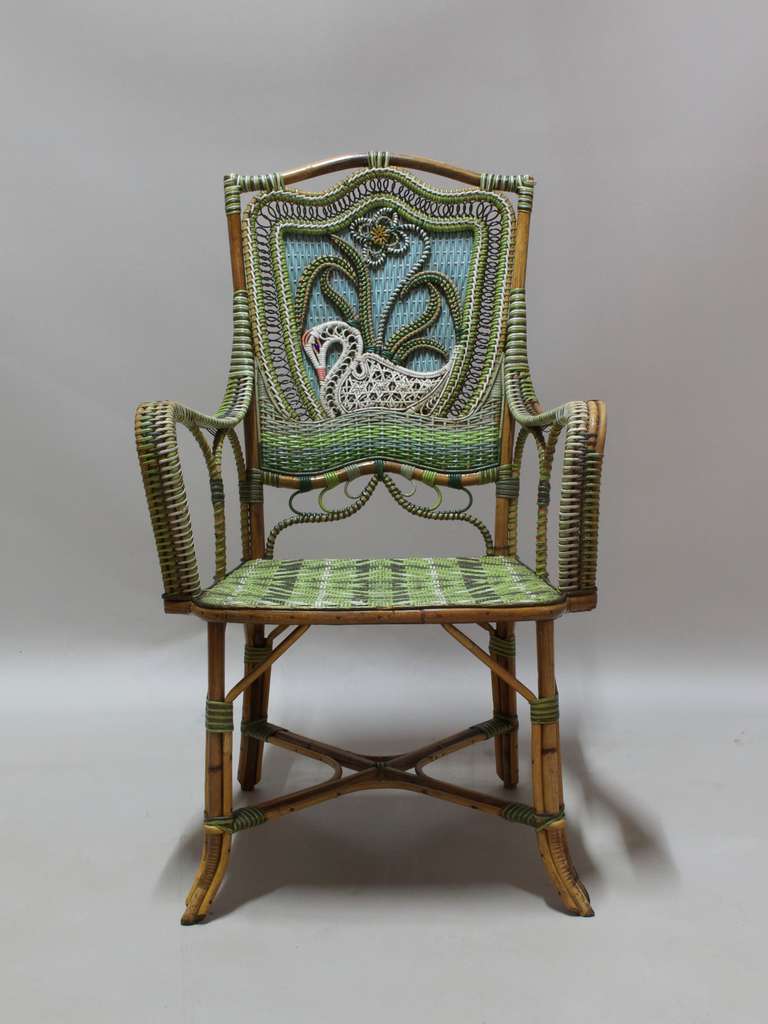 A rare and gorgeous armchair with elegant swan and plant motif on the back.
Most likely by Perret & Vibert (