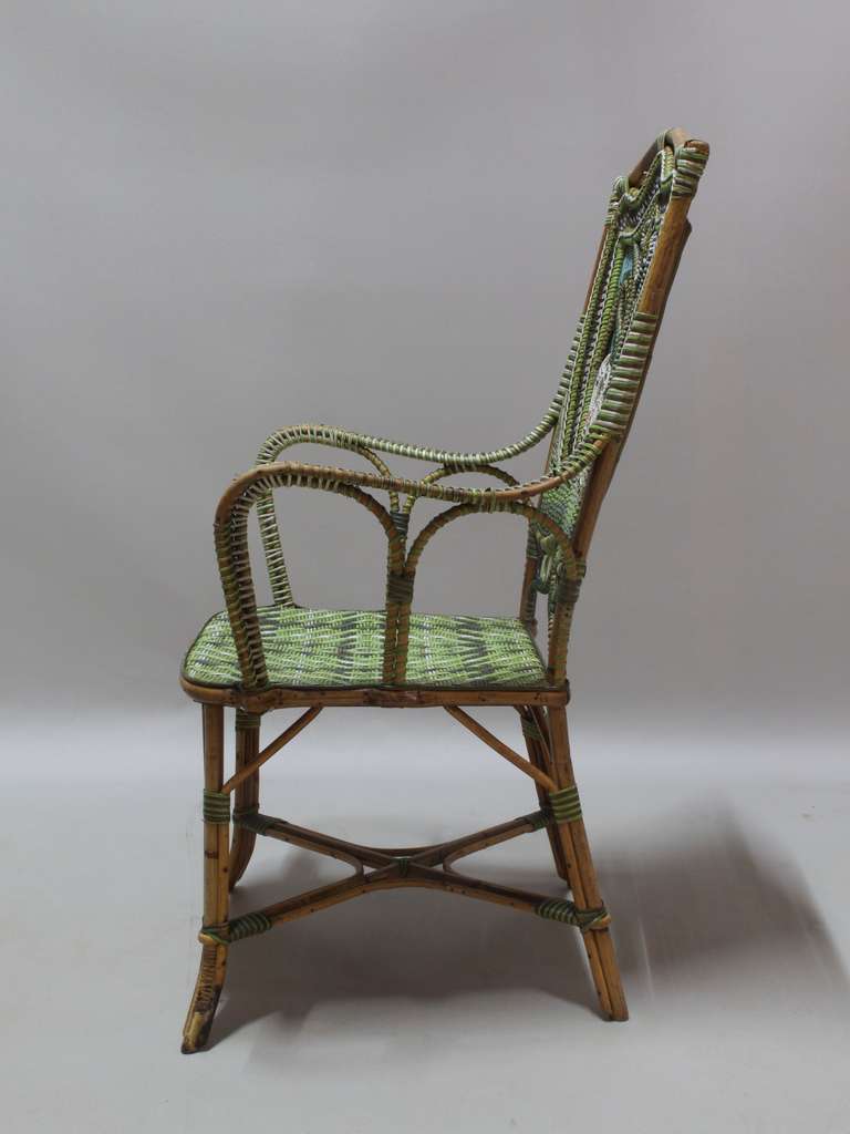 French Rattan Armchair with Swan Decor - France, 19th Century