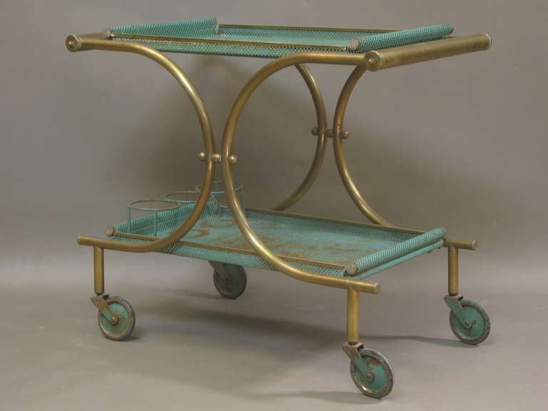 Tubular brass bar cart/serving trolley with removable perforated sheet metal trays, in original mint green colour. Original casters.