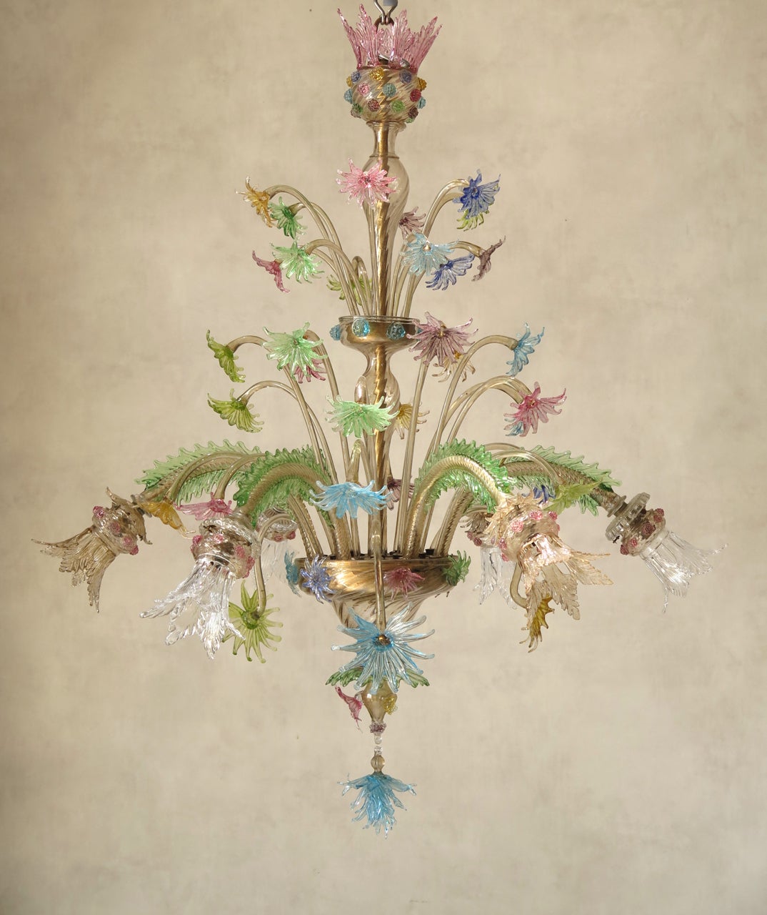 Rare, elegant and delicately-coloured six-light Venetian chandelier, in pale champagne, pink, blue, green and yellow handblown glass. Beautifully made.