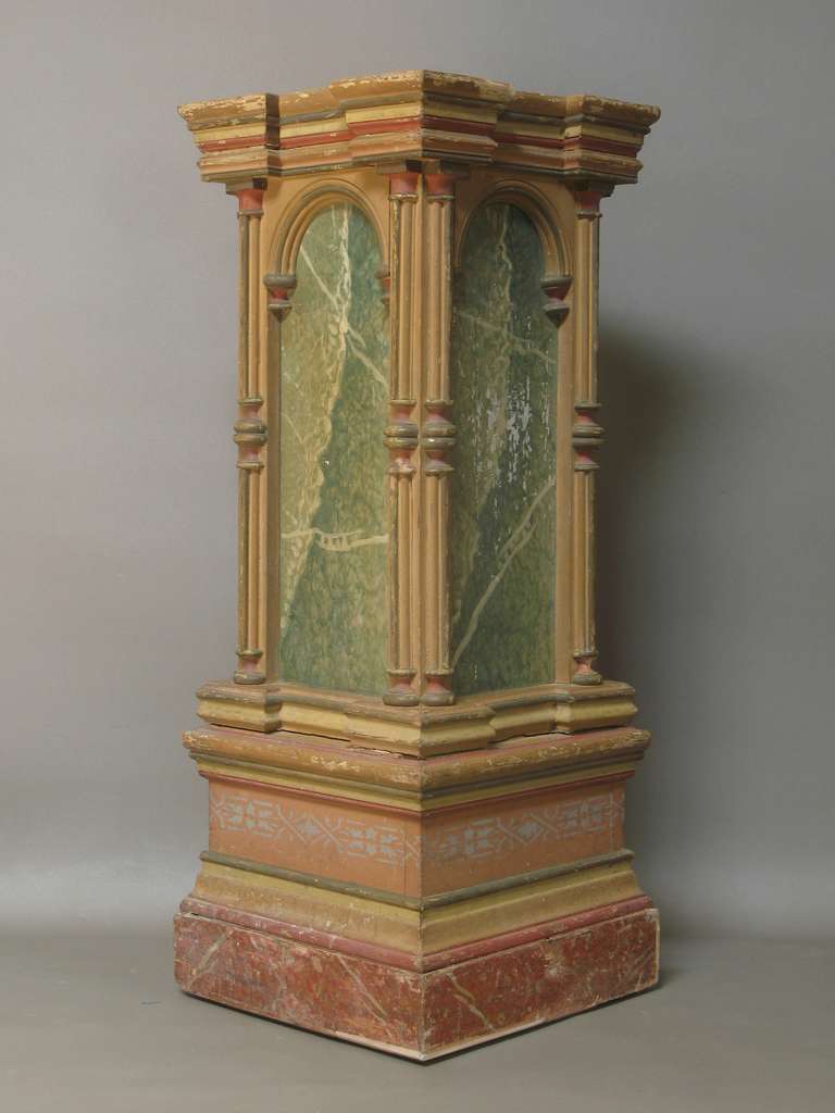 Rare pair of beautiful antique carved and painted decorative pedestals/columns.

Painted in marble trompe l'oeil. Stencilled frieze on base. Lovely antique ochre-toned colours.