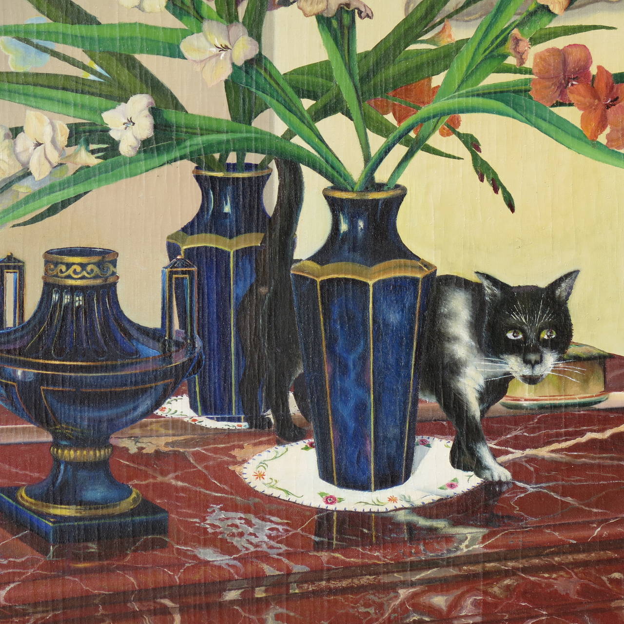 Decorative painting representing a black and white cat on a red marble trompe l'oeil commode, stepping around a deep blue and gold vase containing a bouquet of gladioli, against a floral wall-papered background. Visible in the reflection in the