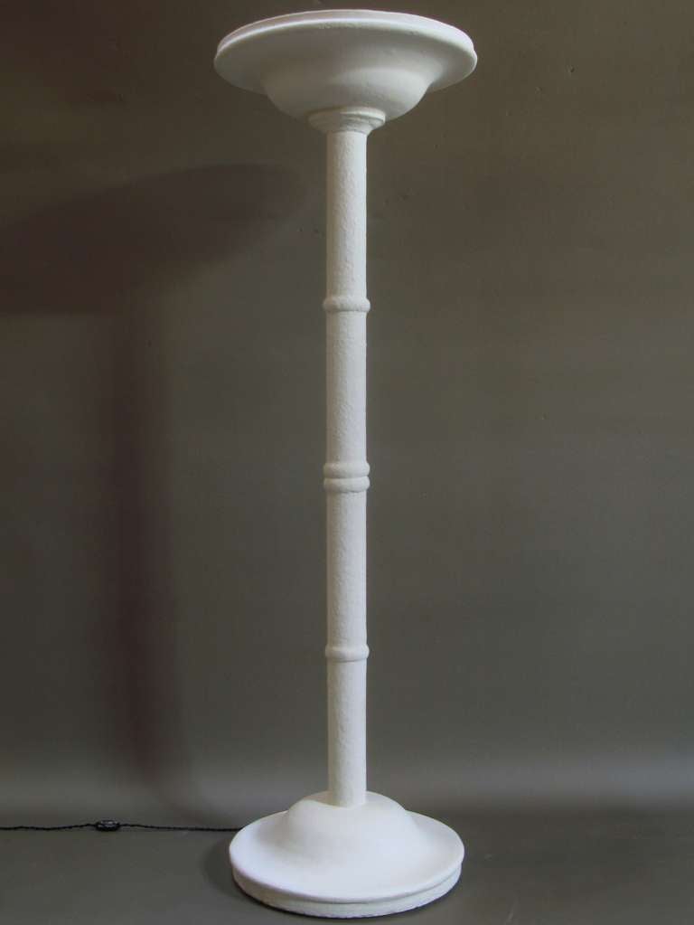 Lovely and heavy floor lamp made of plaster with a textured finish.