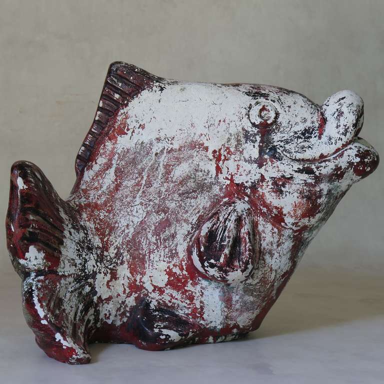 Lovely stylized cement fish sculpture, originally a fountain. Red and black patina.