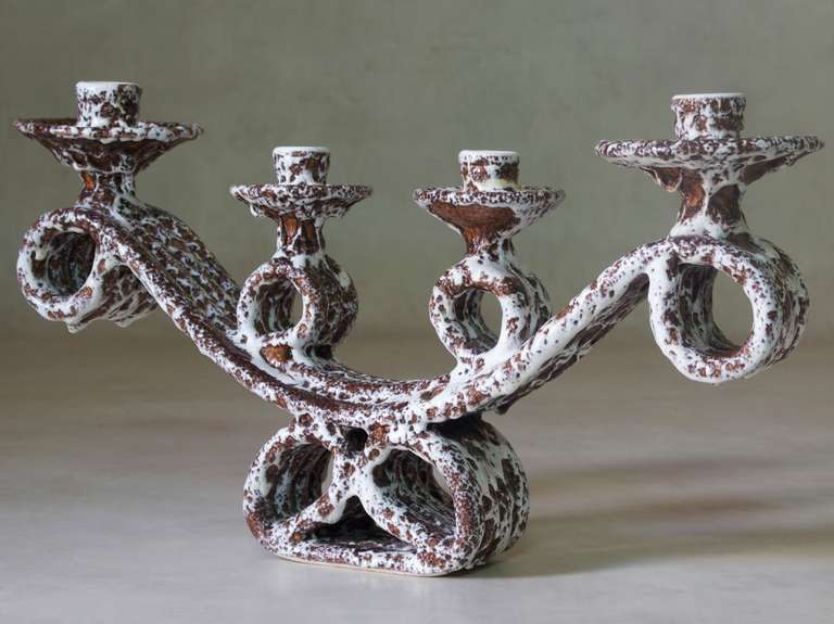 Pair of large scale ceramic candle holders by Marius Giuge, with a brown and white glaze. Stamped on the bottom.
