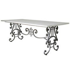Lyre Motif Wrought Iron and Travertine Table