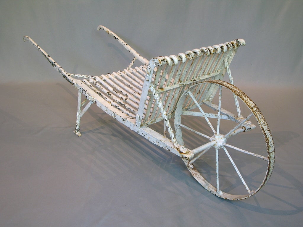 Charming wheelbarrow from the town of Arras, in France, famous for its high quality wrought iron garden furniture up until the early 20th century.