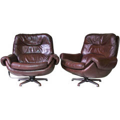 Pair of Leather Swivel, Egg-Shape Armchairs