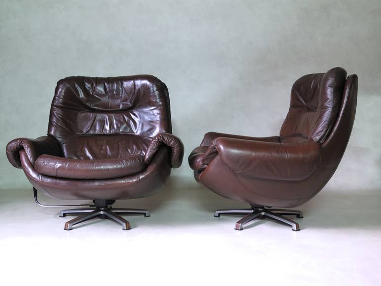 Pair of Leather Swivel, Egg-Shape Armchairs