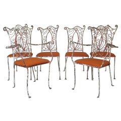 Set of Four Wrought Iron Chairs and Two Armchairs