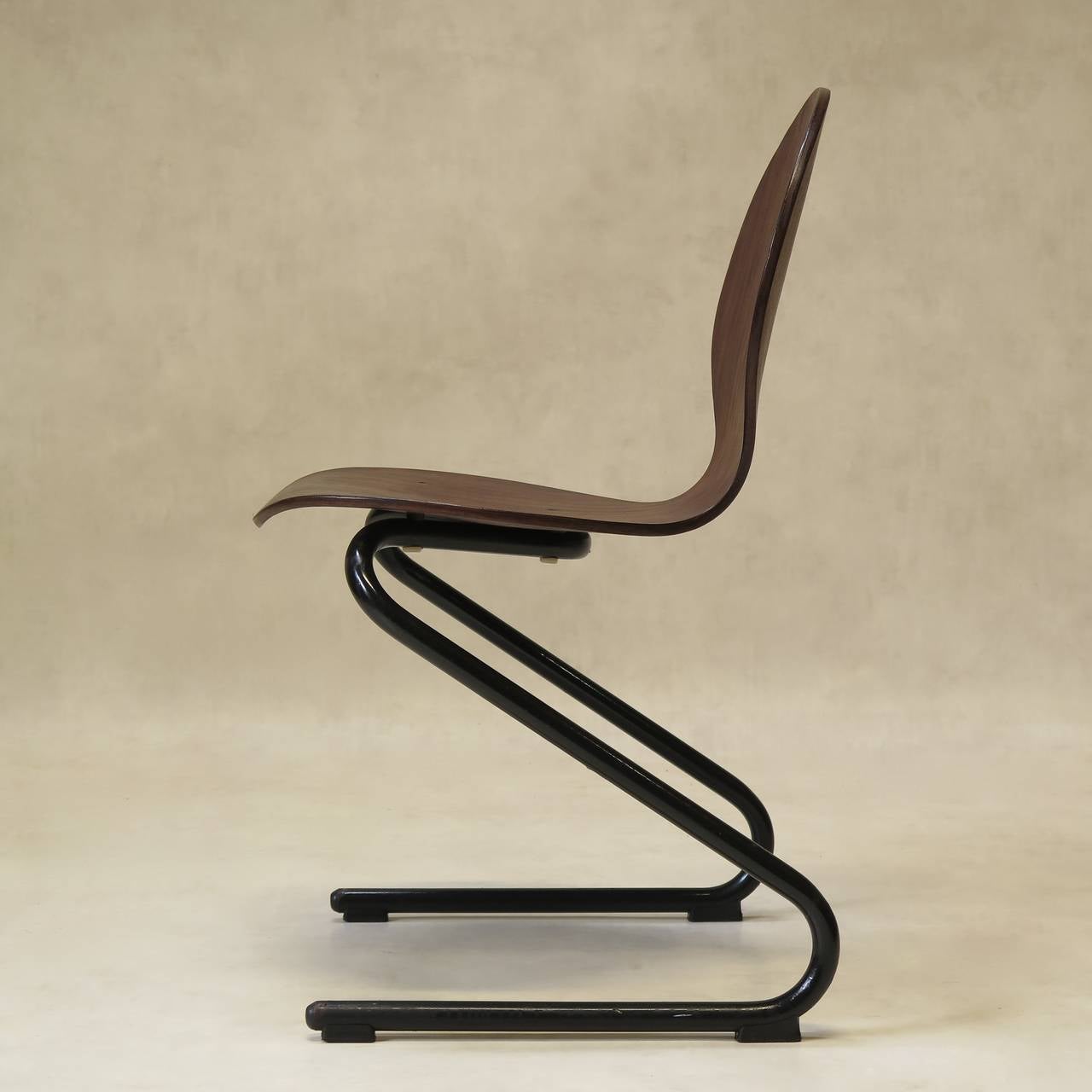 Four Mid-Century Plywood and Metal Cantilever Spring Chairs at 1stDibs