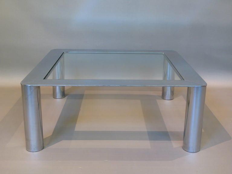 Square chrome and glass coffee or center tables by Sergio Mazza and Giuliana Gramigna for Cinova.

Heavy and well-made.