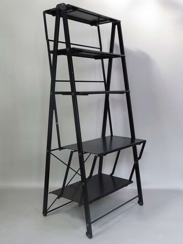Pair of collapsible shelves of modern design, made of aluminium with a black enamel-like finish. Very nicely made.