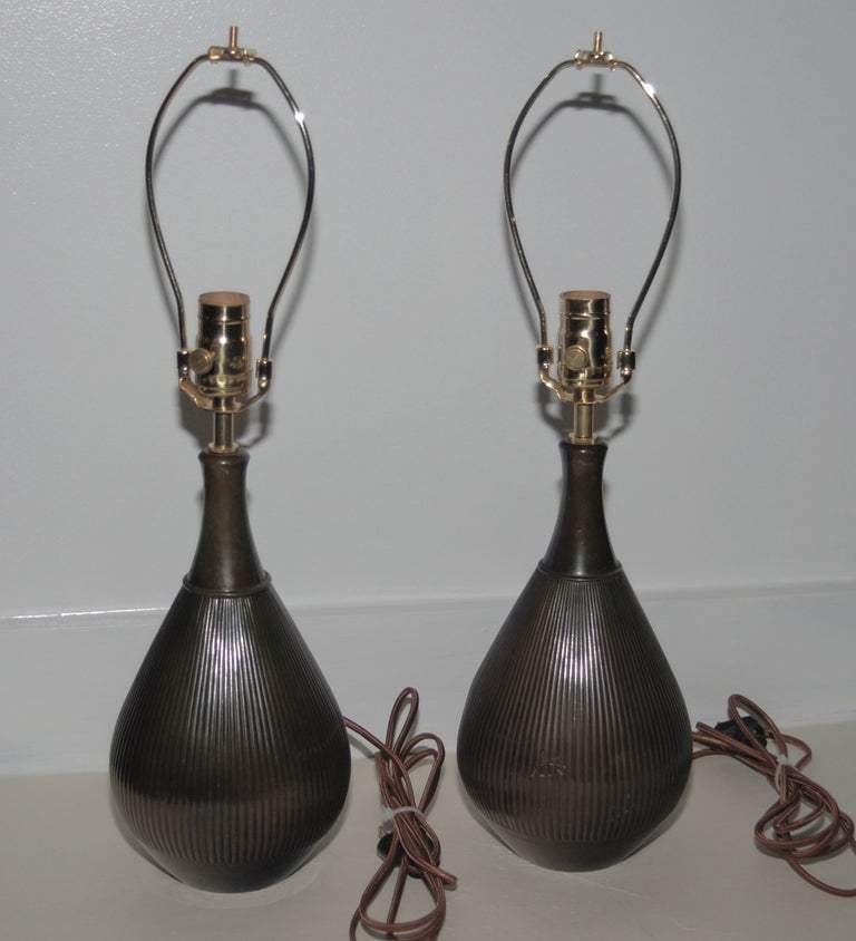 A pair of table lamps by Just Andersen (1884-1943), Denmark, 1930s. Each lamp stamped: Just Denmark, 1832. Diameter 7