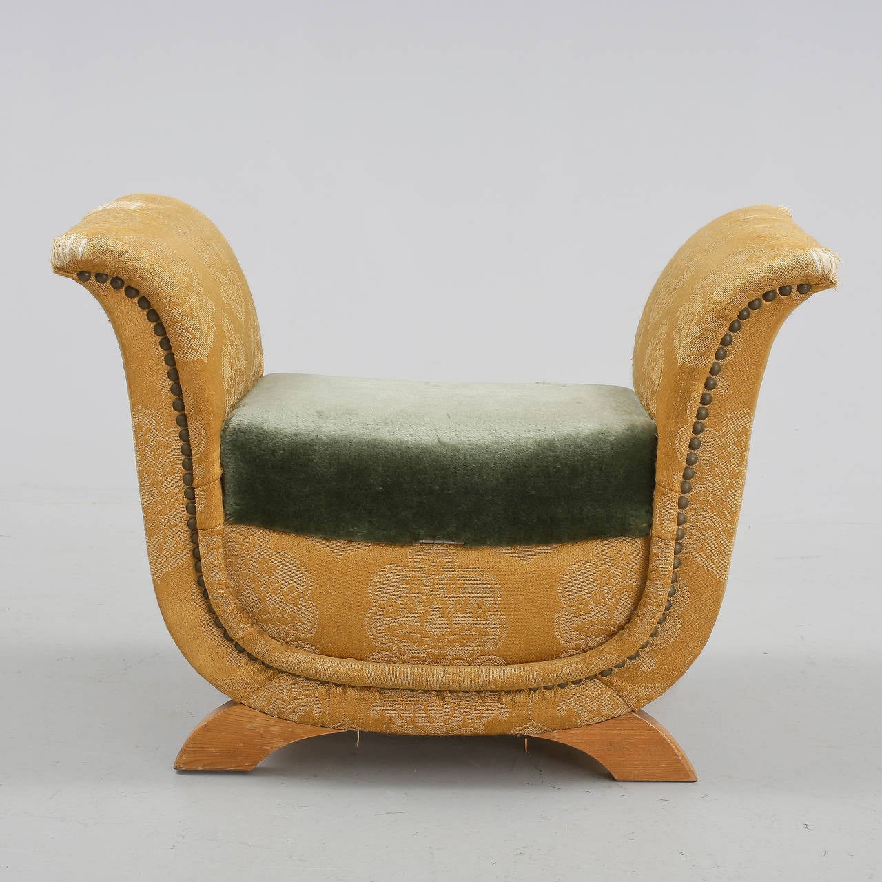 A bench or foot stool with storage designed by Otto Schulz, Sweden, circa 1940.