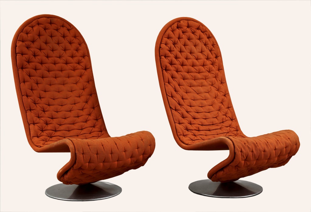 A pair of vintage, tall back lounge chairs Designed by Verner Panton for Fritz Hansen in 1973
Original tufted fabric upholstery over metal frame.
Price is for the pair.