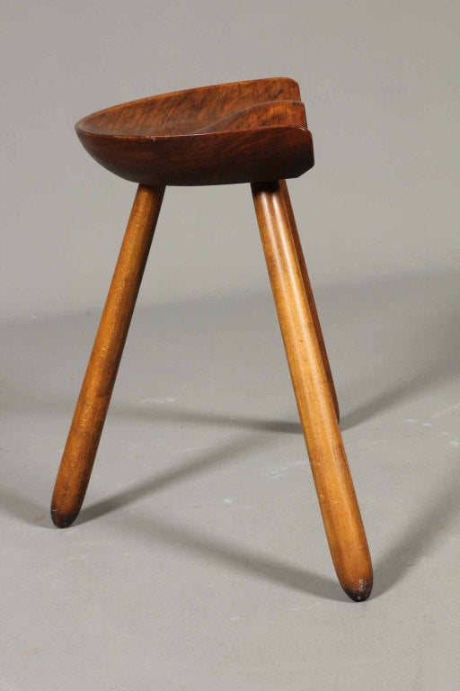 wooden stool with hole in middle