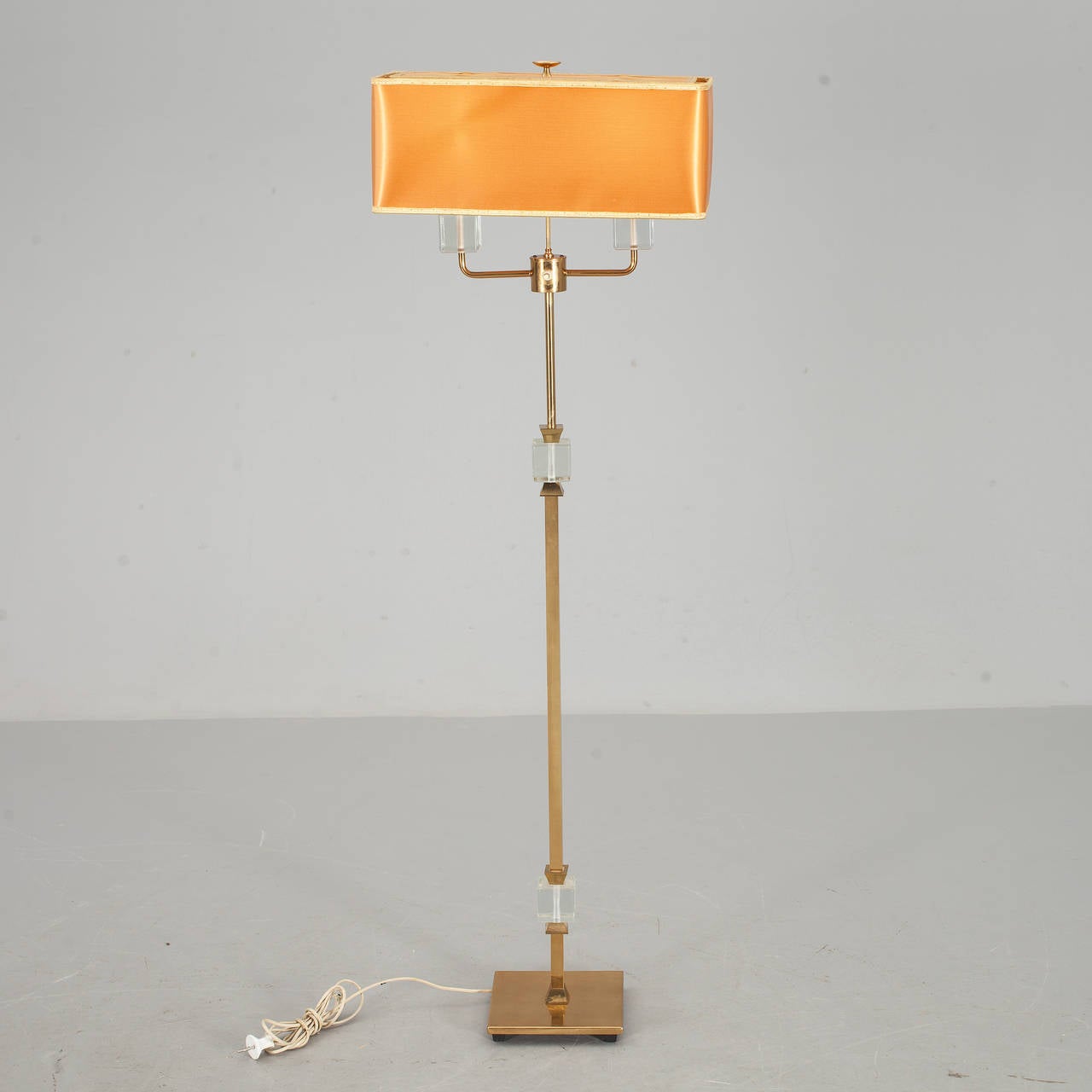 A floor lamp by Malmo metal product company, Sweden, circa 1950.
Brass and glass. Shade not included.
Existing European wiring, rewiring available upon request. Measure: H 55