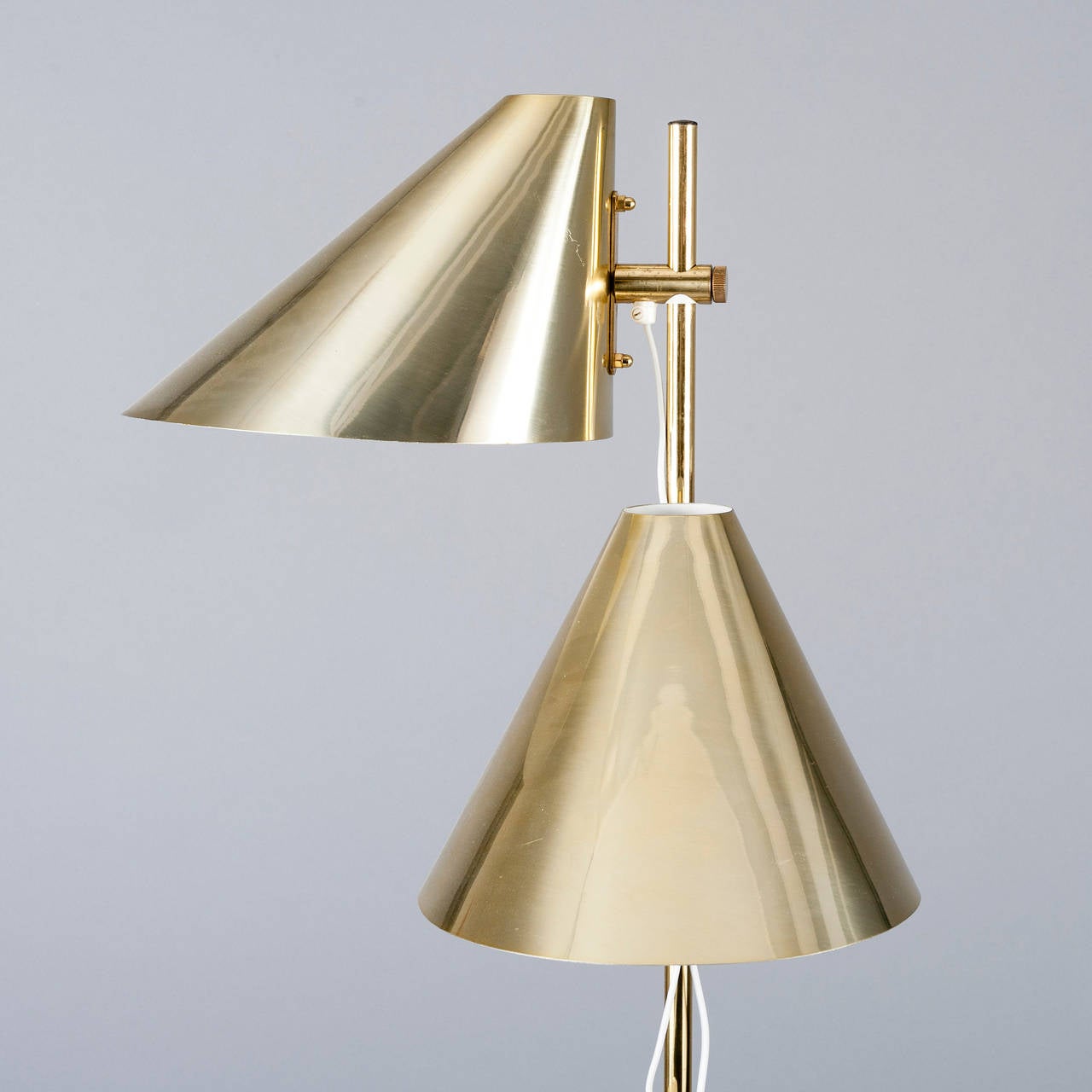 Floor lamp designed by Hans-Agne Jakobsson, Sweden, circa 1970s.
Two adjustable height shades, polished brass finish. Dimensions:
H- 60