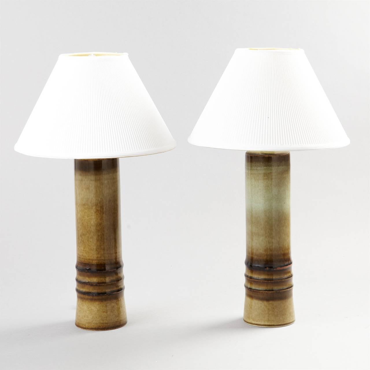 A pair of table lamps by Olle Alberius for Rorstrand, Sweden. Signed. Measures: H- 16.5