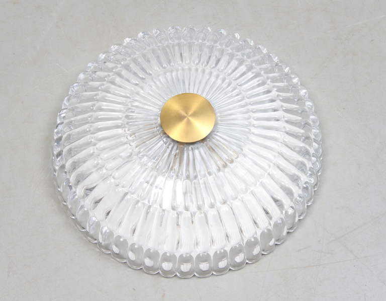 A Ceiling Light by Carl Fagerlund for Orrefors, Sweden. Circa 1960th.
Textured glass and brass. Diam. 15.75".
Existing European wiring, rewiring available upon request.
2 fixtures available, price is for each.