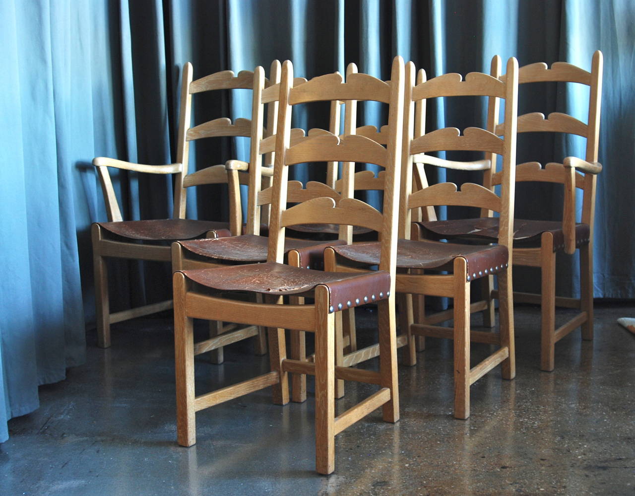A six chairs dining set by Axel Einar Hjorth, Sweden, circa 1940.
Cerused oak with leather seats.
Marked: AE Hjorth.
Wood frame in perfect vintage condition. Original leather seats heavily damaged.