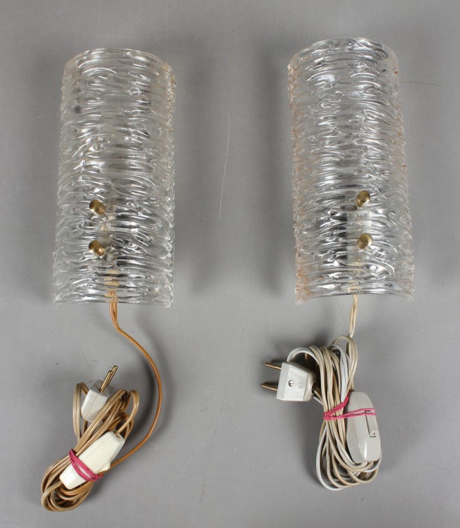 Two pair of sconces by Carl Fagerlund for Orrefors, Sweden.
Existing European wires. Re-wiring available upon request.
Priced individually.
