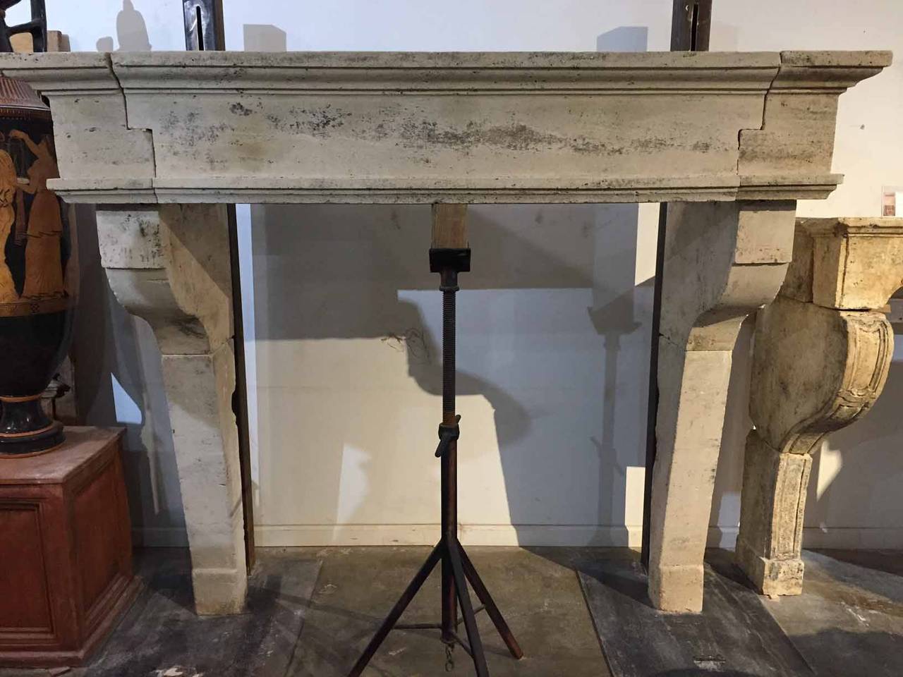 Louis XIII limestone mantel.

Measurements: 78 1/2″ W x 28 1/2″ D x 68 1/4″ H.
Firebox: 57″ W x 55″ H.