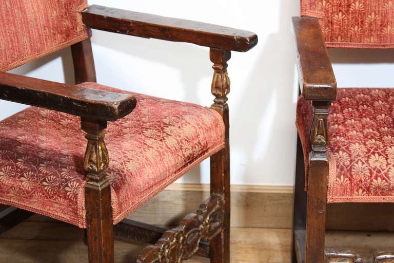 Lovely pair of Spanish Walnut chairs circa 1740 with polychrome accents and a fantastic patina. See additional photos on dealers website.